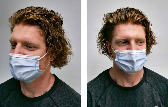 young men this mask on face with new hair perm