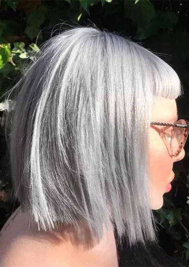 profile face with short fringe and platinum blonde
